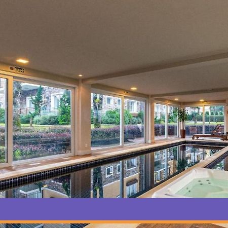 Rosa Edificio Casa De Pedra Apartment Gramado Ngoại thất bức ảnh